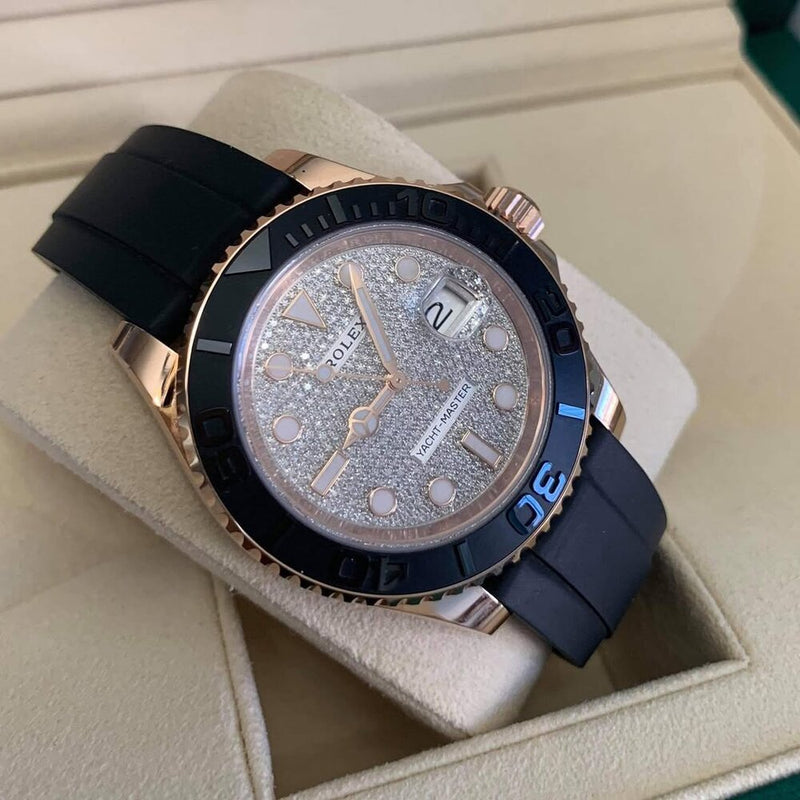 Rose gold diamond-dial sports watch on a navy strap